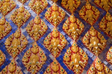 Geleneksel Tay tarzı sıva Tapınağı, T kilise duvarına