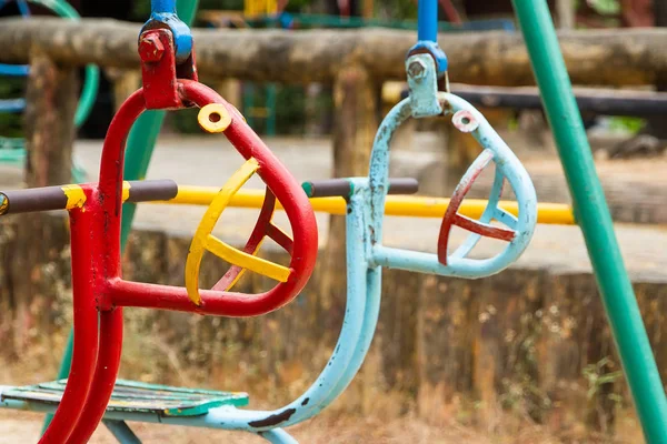 Colorful children swing in playground.Toys for children — Stock Photo, Image