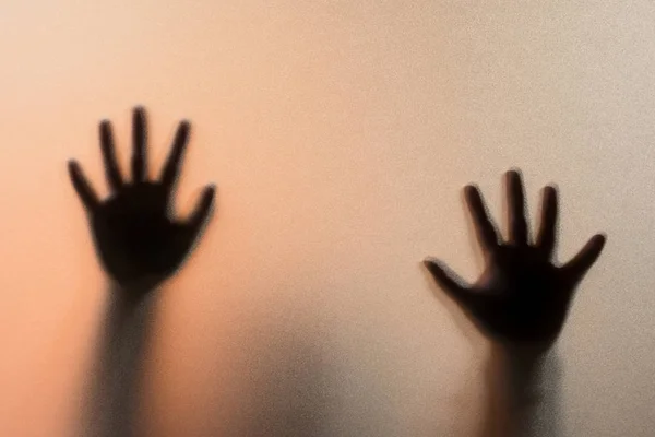 Shadow blur hands of the Man behind frosted glass.Blurry hand ab — Stock Photo, Image