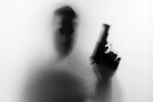 Sombra del asesino del hombre del horror con un arma en su mano.Hombre peligroso —  Fotos de Stock