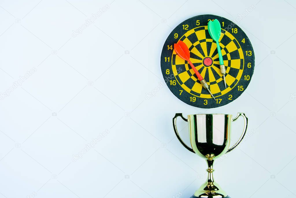 Golden trophy, Darts with crotch isolated on white background wi