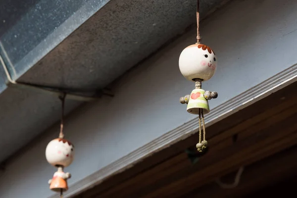 Hanging ceramic dolls to decorate.