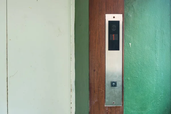 Lift with buttons on vintage background.Thailand.