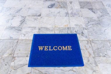 Hoş geldiniz paspası zemin arkaplanda.