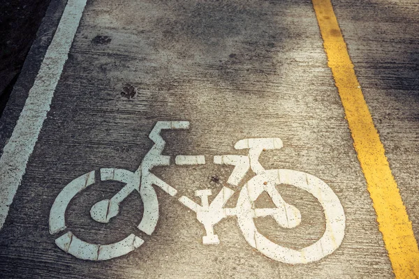 White bike symbol on the pavement in Thailand. — Stock Photo, Image