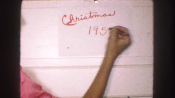 Emberi kéz írása karácsonyi poszter — Stock videók