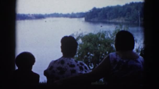 Women near lake — Stock Video