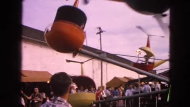 People in amusement park having fun — Stock Video