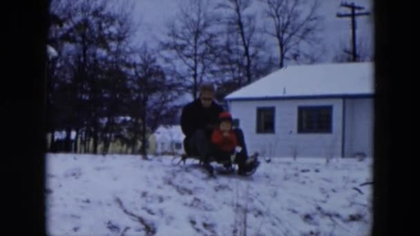 Kid sledging from hill — Stock Video