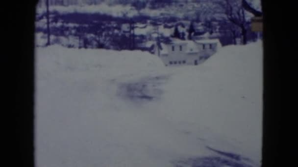 Liten stad efter snöfall — Stockvideo