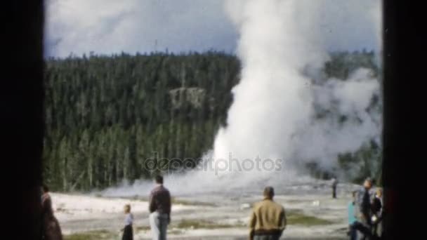 People looking at geyser — Stock Video