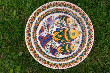 Ceramic plates painted with various traditional antique patterns, plate of painted fish clipart