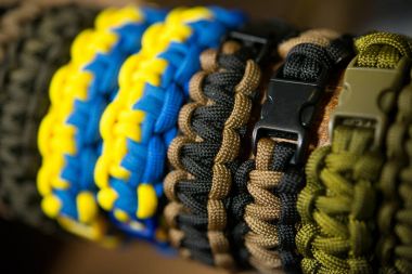 Braided rope bracelets on a buckle clipart