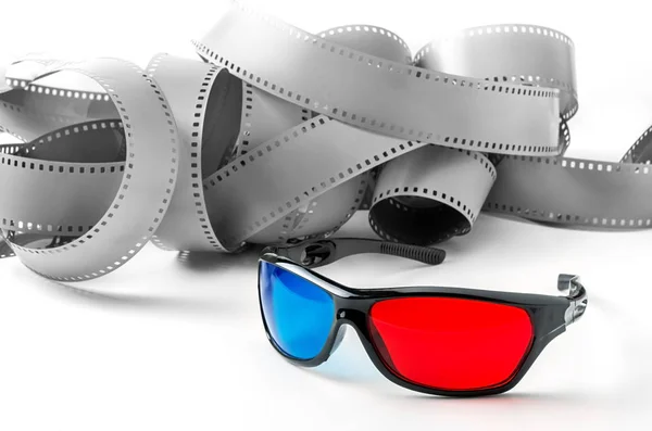 3d glasses and  film strip on a white background — Stock Photo, Image