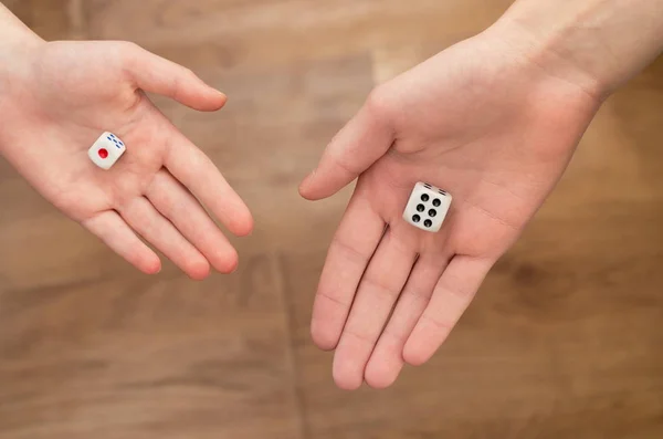 Dice in the palms of the hands — Stock Photo, Image