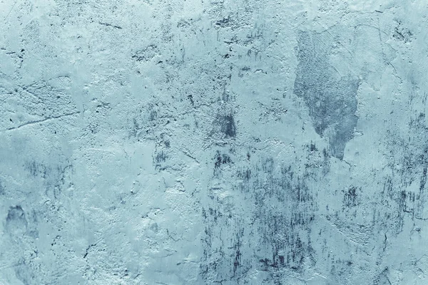 Boyalı beton bir duvarın dokusu. Üzerinde boya var. Soyut bir arkaplan.