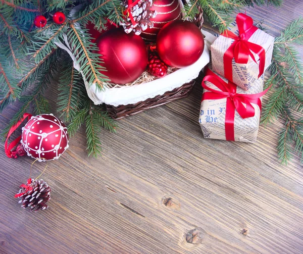 Christmas red baubles and gifts — Stock Photo, Image