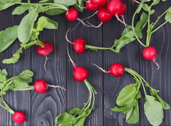 Red fresh radish on wooden table — Stock Photo, Image