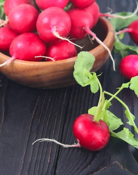 Red fresh radish on wooden table — Stock Photo, Image