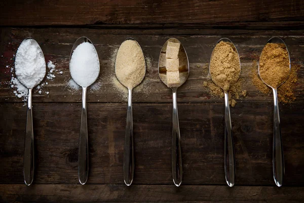 Different Kinds of Sugar in the Spoons