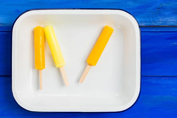 Bright Ice Popsicles made from Lemon, Pineapple, Berries — Stock Photo, Image