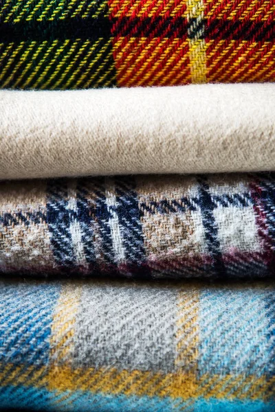 Stack of woolen checked blankets — Stock Photo, Image