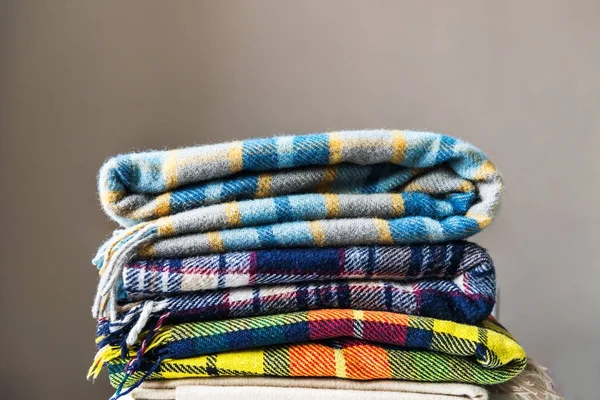 Stack of woolen checked blankets — Stock Photo, Image