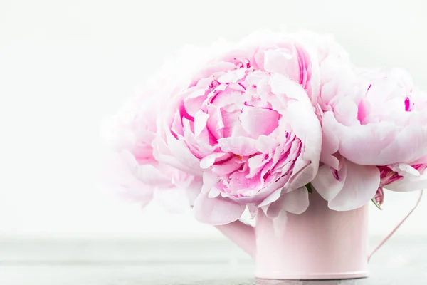 Fresh bunch of pink peonies on light background — Stock Photo, Image
