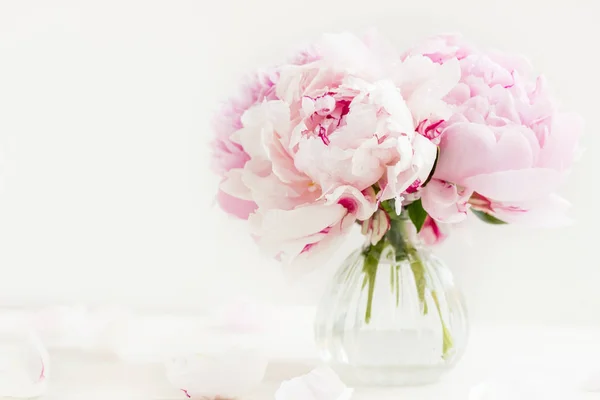 Fresh bunch of pink peonies on light background — Stock Photo, Image