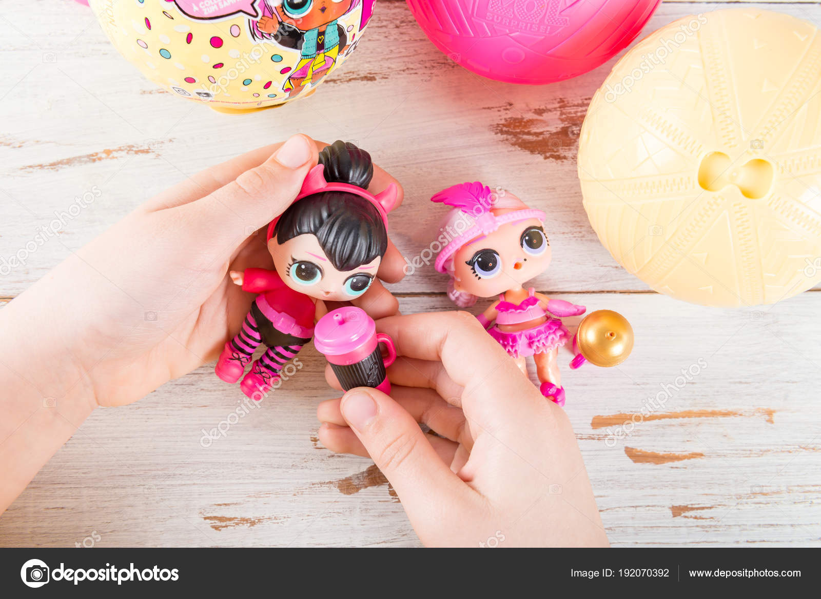 girls playing with lol dolls