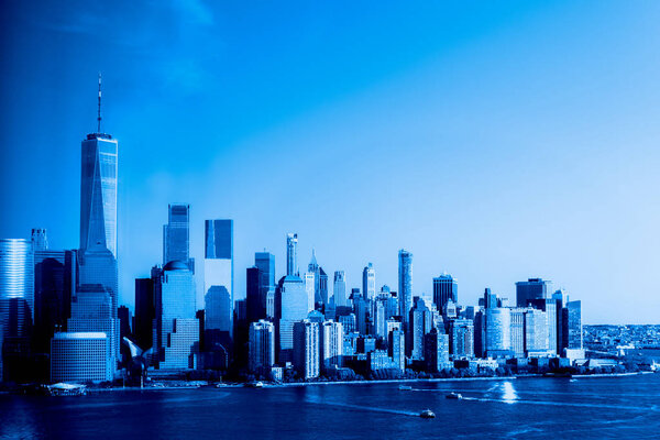 Amazing panorama view on New York City skyline and Downtown Manhattan from Jersey City, toned in Classic blue image