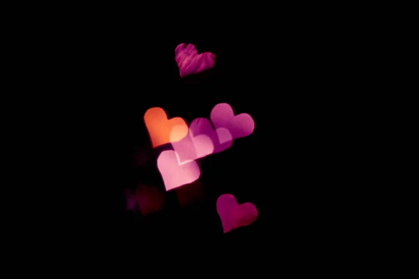 Luz abstracta, patrón bokeh en forma de corazón — Foto de Stock