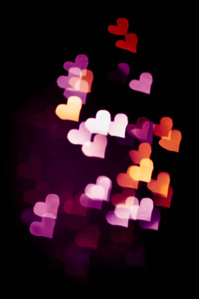 Luz abstracta, patrón bokeh en forma de corazón — Foto de Stock