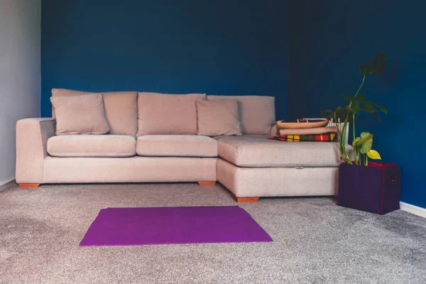 Preparation for online yoga during self isolation. . Yoga mat at the living room, no equipment workout, meditation tips for beginners, stay home and stay healthy concept