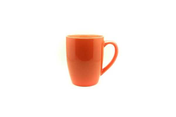 Tasse couleur orange sur isolé — Photo