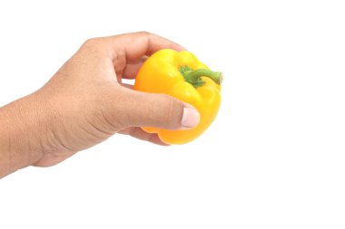 tatlı biber beyaz arka plan üzerinde tutan eller