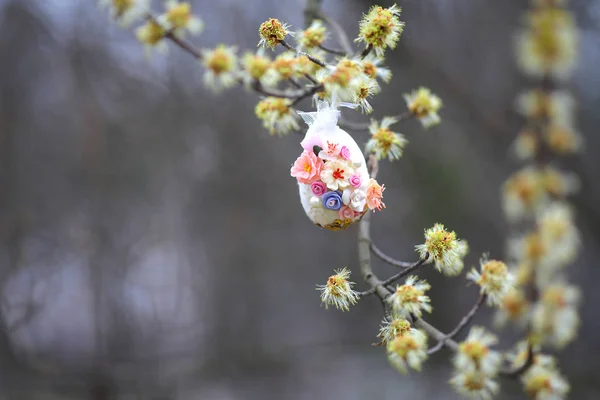 Decorative easter egg. An egg on a tree branch