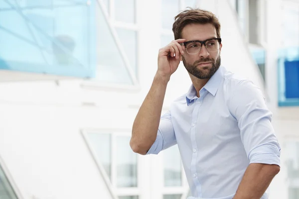 Handsome serious man in spectacles — Stock Photo, Image