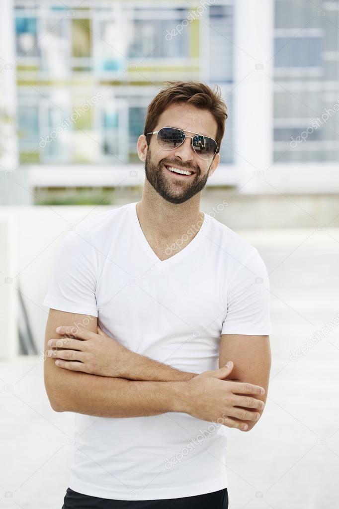 Happy handsome man in sunglasses