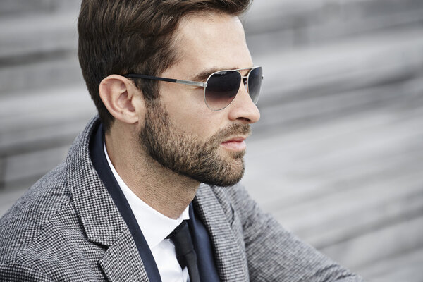 Handsome businessman in sunglasses