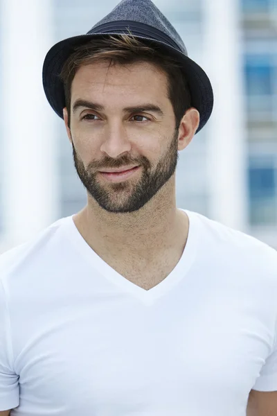 Handsome young man in hat — Stock Photo, Image