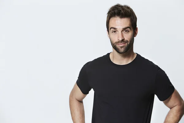 Handsome man in black t-shirt — Stock Photo, Image