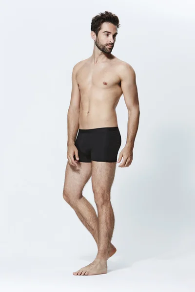 Bonito barbudo homem de shorts — Fotografia de Stock