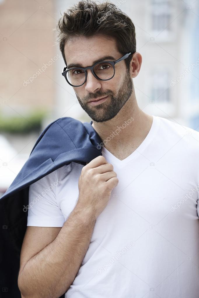 Man with beard and spectacles