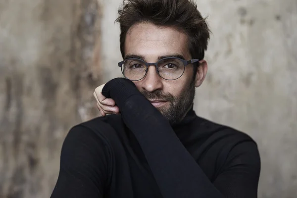 Man in black sweater and spectacles — Stock Photo, Image