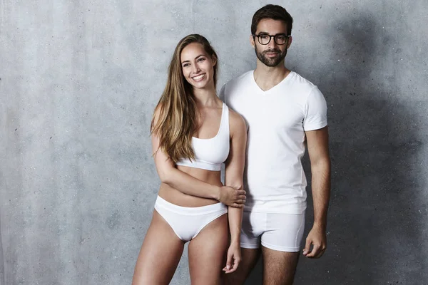 Beautiful couple in white underwear — Stock Photo, Image