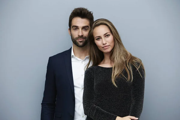 Stunning smartly dressed couple — Stock Photo, Image