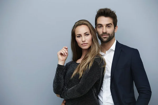 Confident couple in smart clothing — Stock Photo, Image
