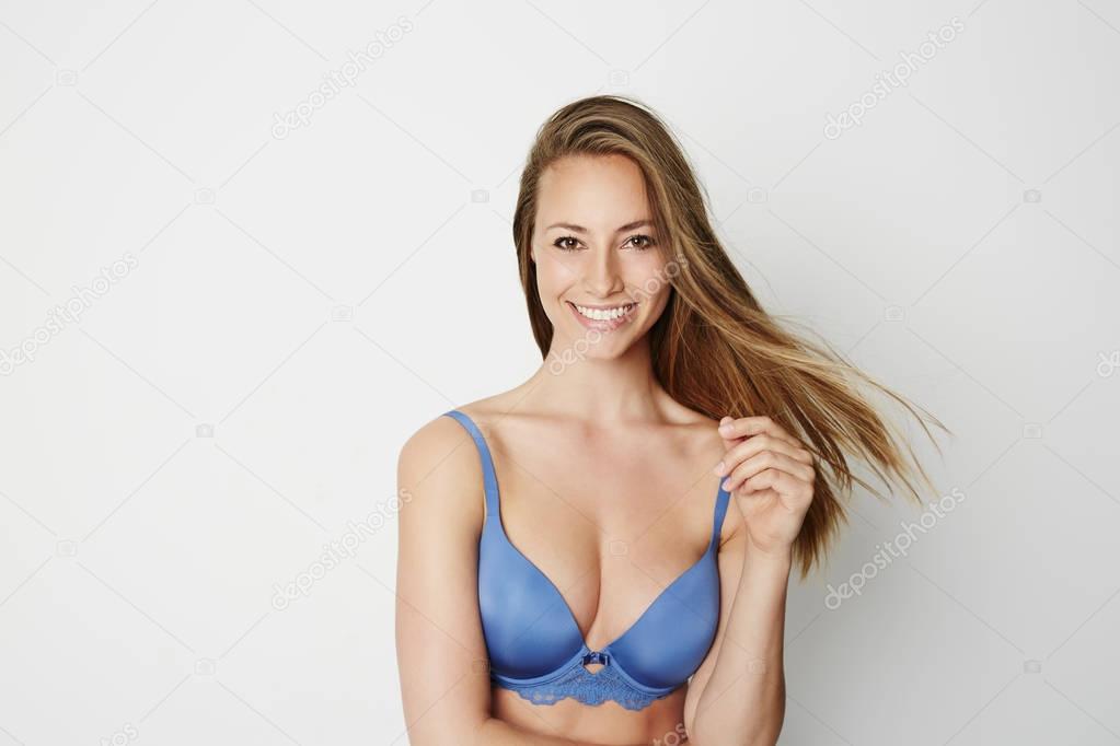 Beautiful woman in blue bra Stock Photo by ©sanneberg 128841576