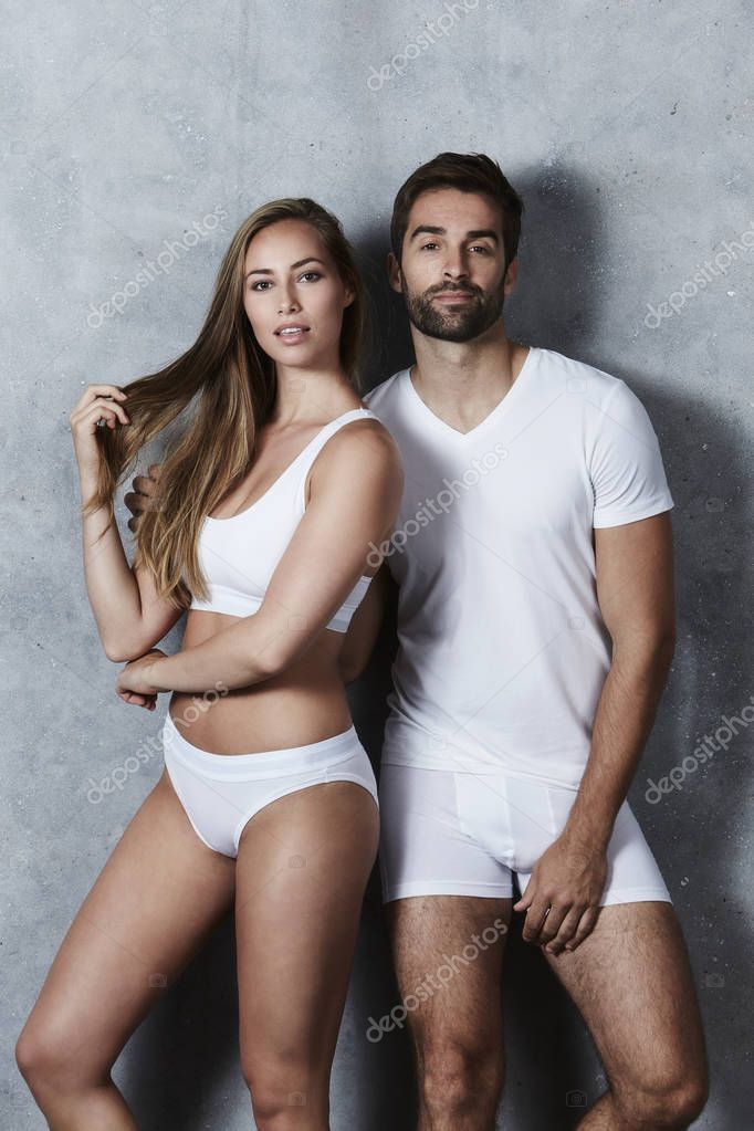 Beautiful couple in white underwear Stock Photo by ©sanneberg 128847814